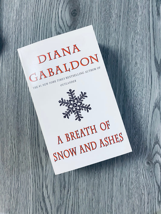 A Breath of Snow and Ashes (Outlander #6) by Diana Gabaldon- pocketbook